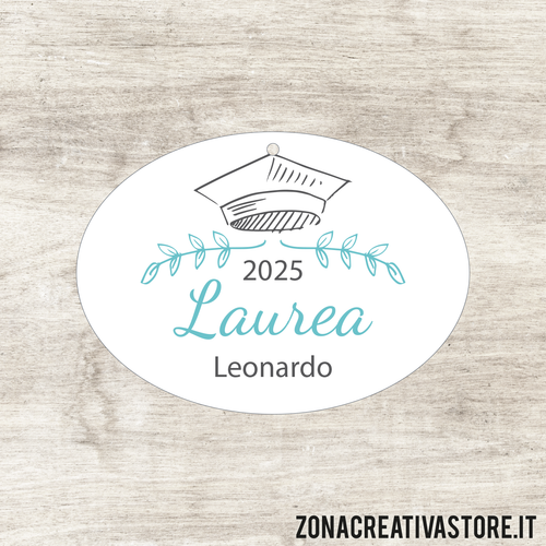 TAG A FORMA OVALE PER LAUREA DISPONIBILI IN 3 COLORI DIVERSI - MISURA H. 2,7x3,7 CM. Cod. LA005