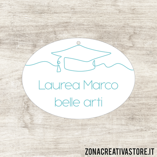 TAG A FORMA OVALE PER LAUREA DISPONIBILI IN 3 COLORI DIVERSI - MISURA H. 2,7x3,7 CM. Cod. LA002